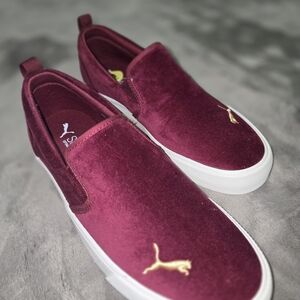 Puma Burgundy Slip-On Sneakers with White Soles and Gold Logo